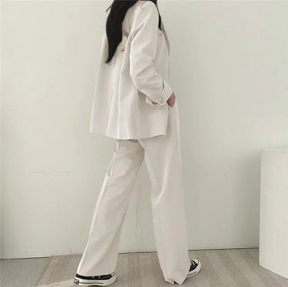 Eleganter Blazer und gerade geschnittene Hose für Damen - Image 12