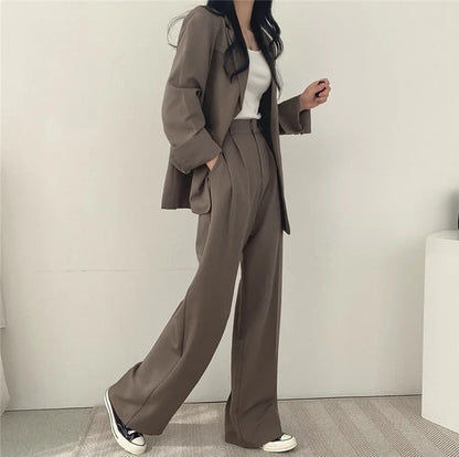 Eleganter Blazer und gerade geschnittene Hose für Damen - Image 24