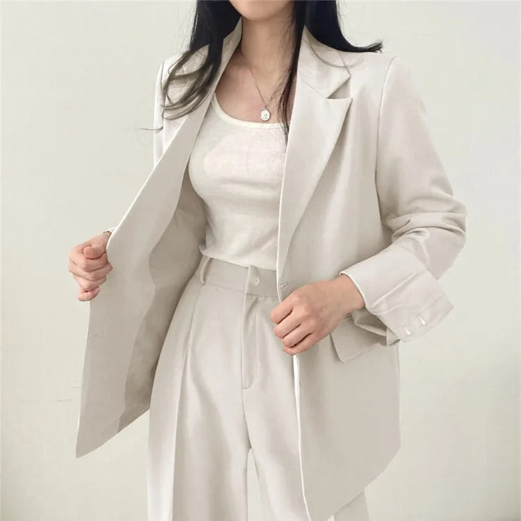 Eleganter Blazer und gerade geschnittene Hose für Damen - Image 9